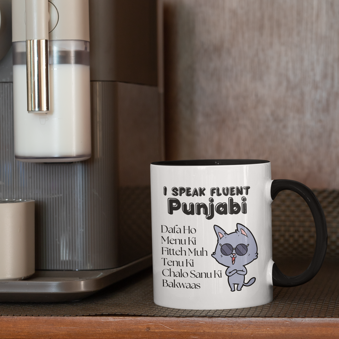 Black Fluent Punjabi mug with a grey cat in sunglasses and the words “I Speak Fluent Punjabi”, “Menu Ki”, “Chalo Sanu Ki” and “Bakwaas”