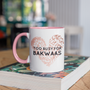 Pink mug with a rose gold leopard-print heart and the words “Too Busy for Bakwaas” in bold black lettering