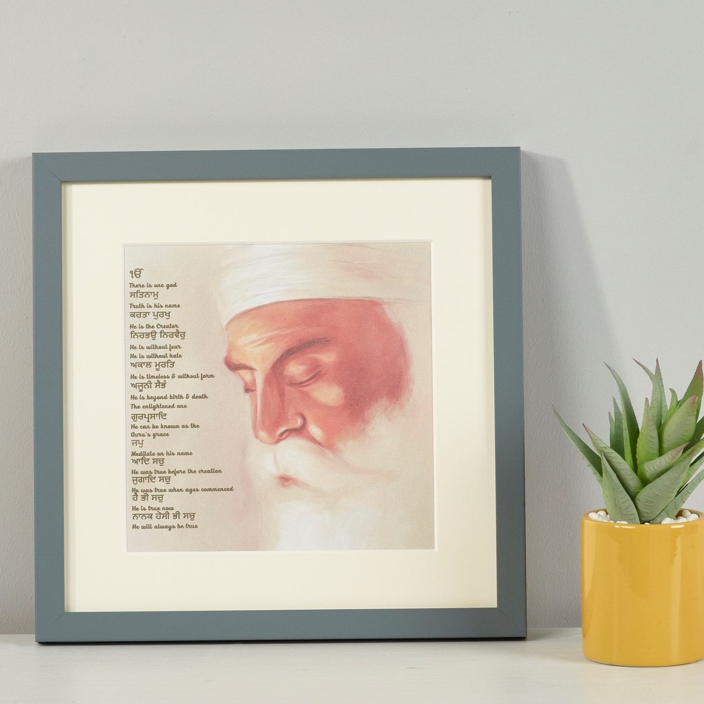 
                  
                    Guru Nanak Frame Including Mool Mantar in Punjabi With Translation
                  
                