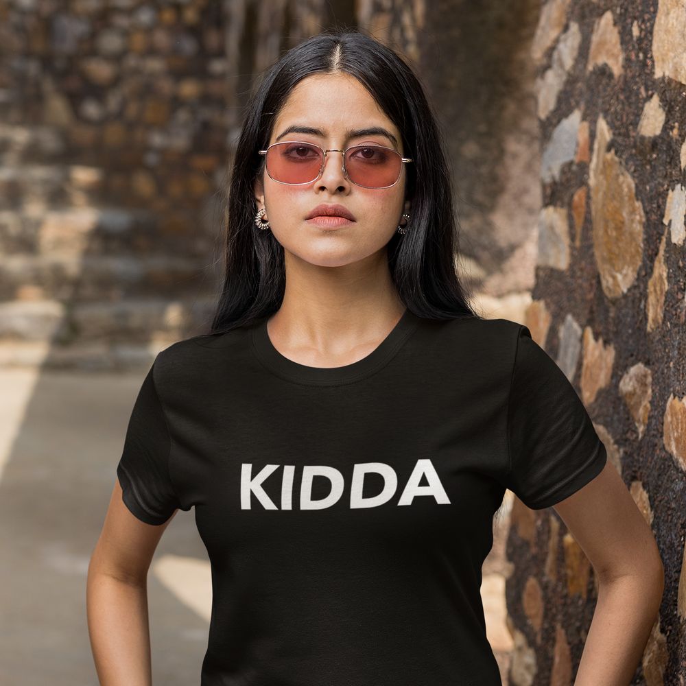 
                      
                        BASIC ESSENTIALS: Kidda Unisex Tee
                      
                    